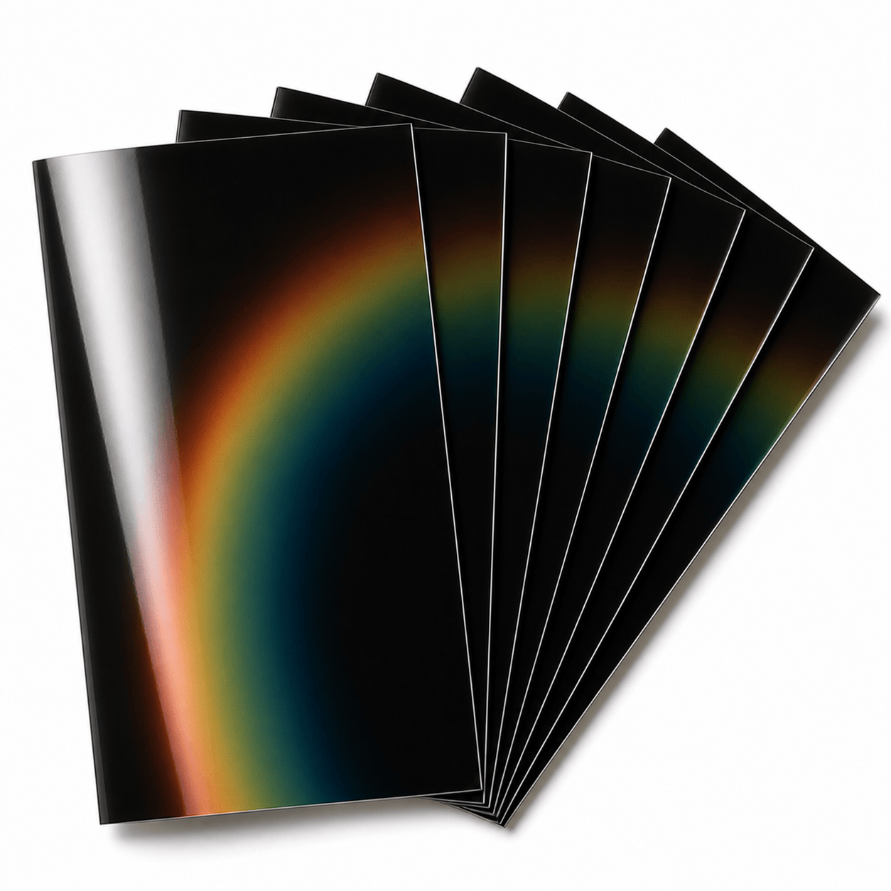 Seven gloss liquid crystal sheets fanned out on a white background, displaying a smooth iridescent gradient from amber to deep teal across the full temperature range