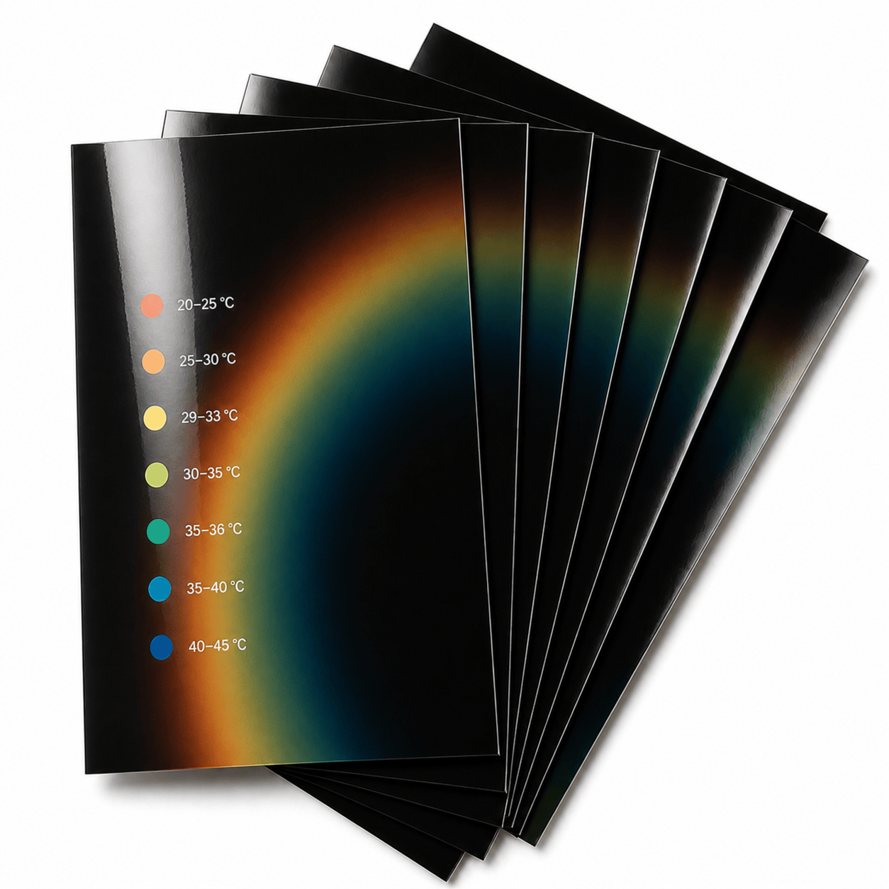 Set of thermochromic film sheets with temperature gradient display on a white background